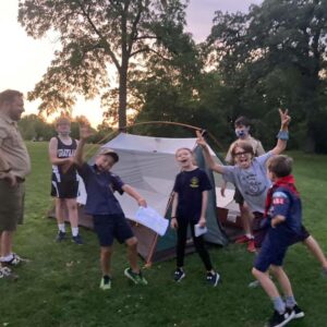 Cub Scouts setting up a tent